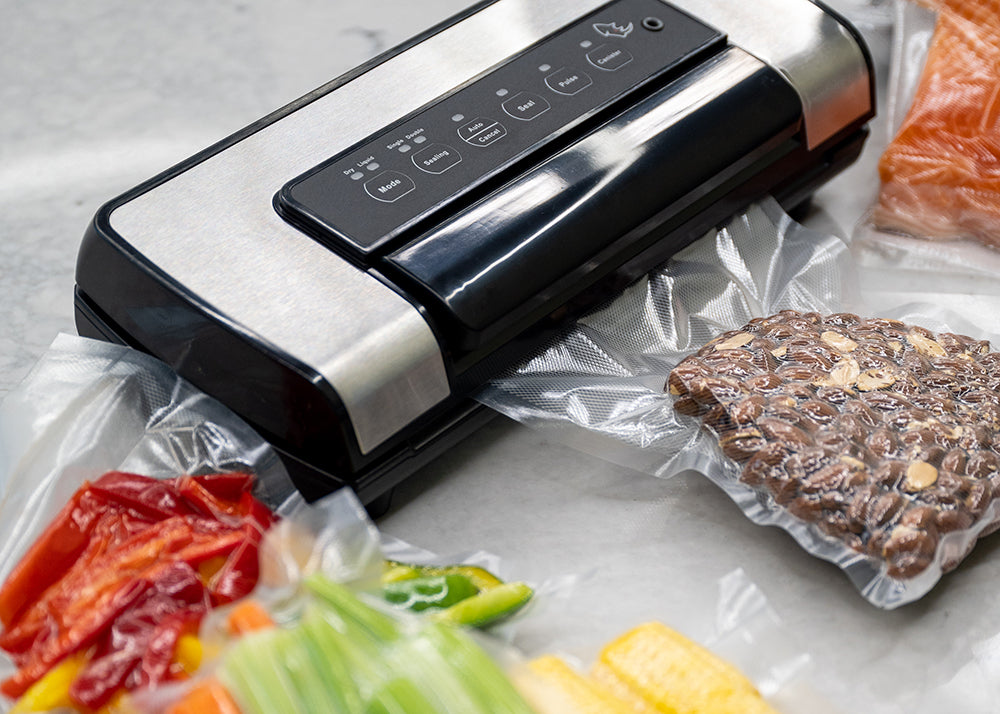 Professional Vacuum sealer with vacuum sealed food products